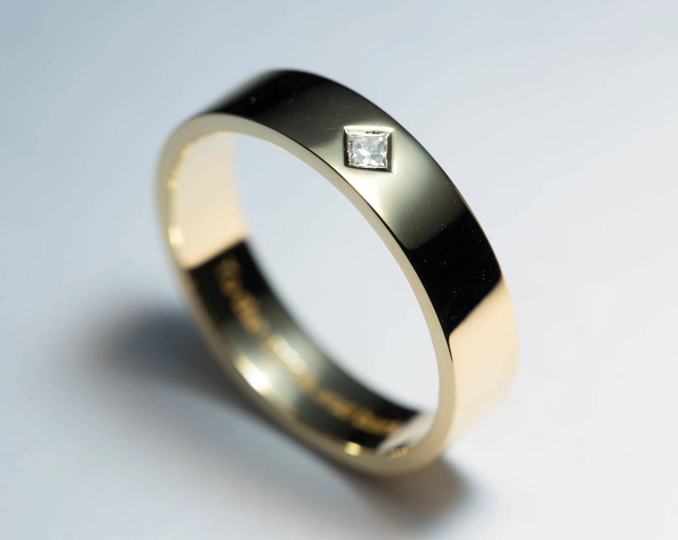 Classic Men's Wedding Band with Princess Diamond
