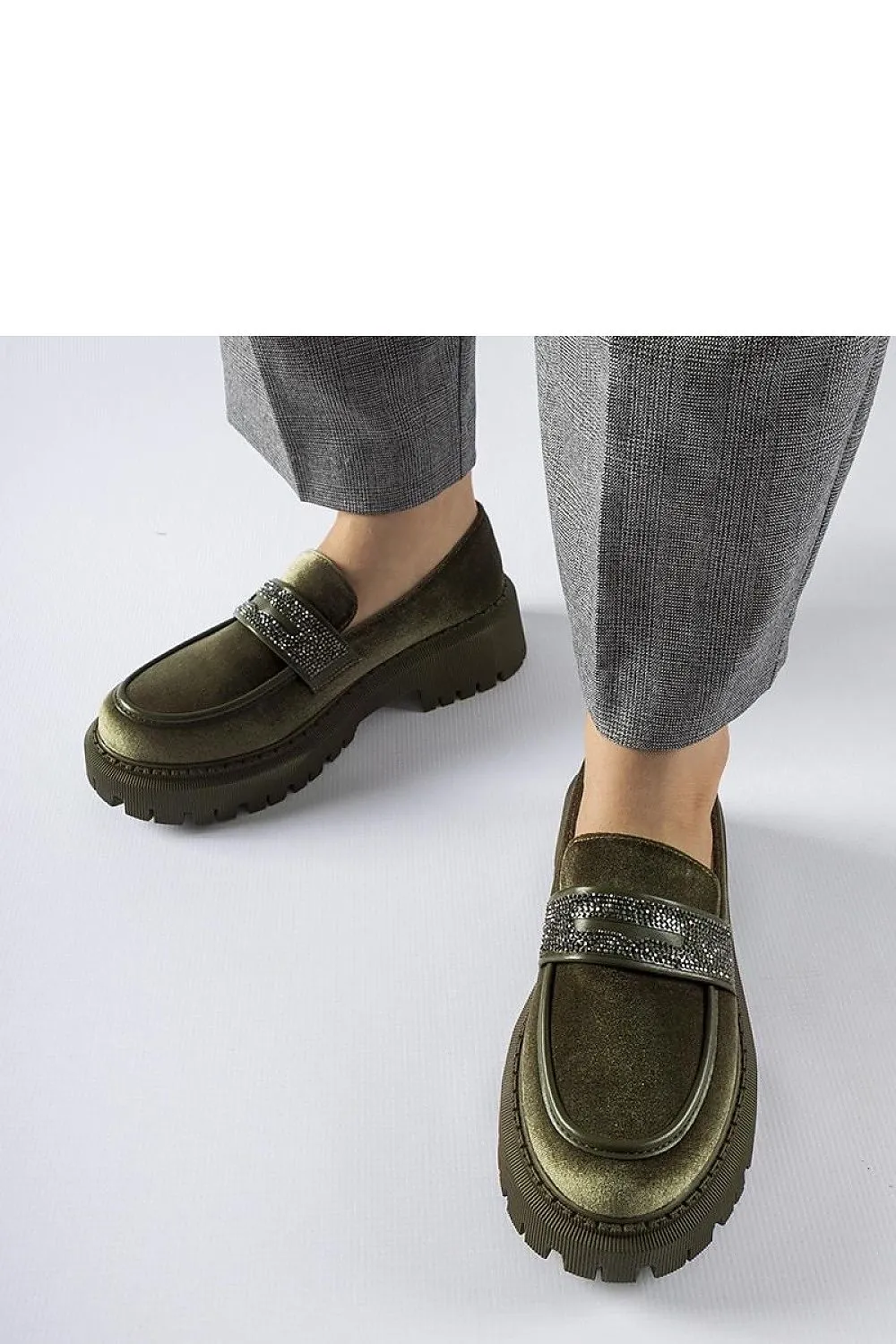 Green moccasins adorned with zircons