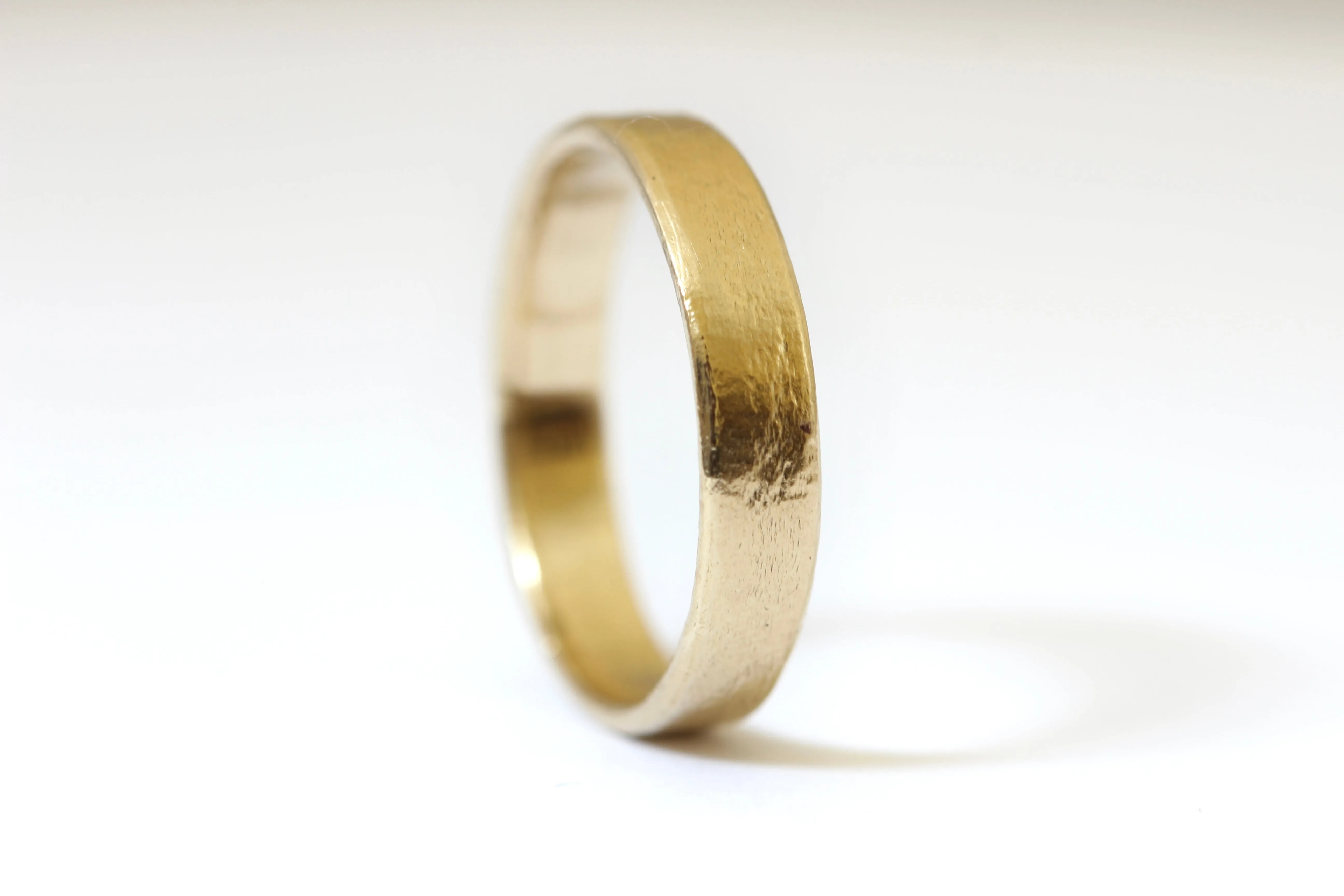 Textured 14k yellow gold wedding ring stacker