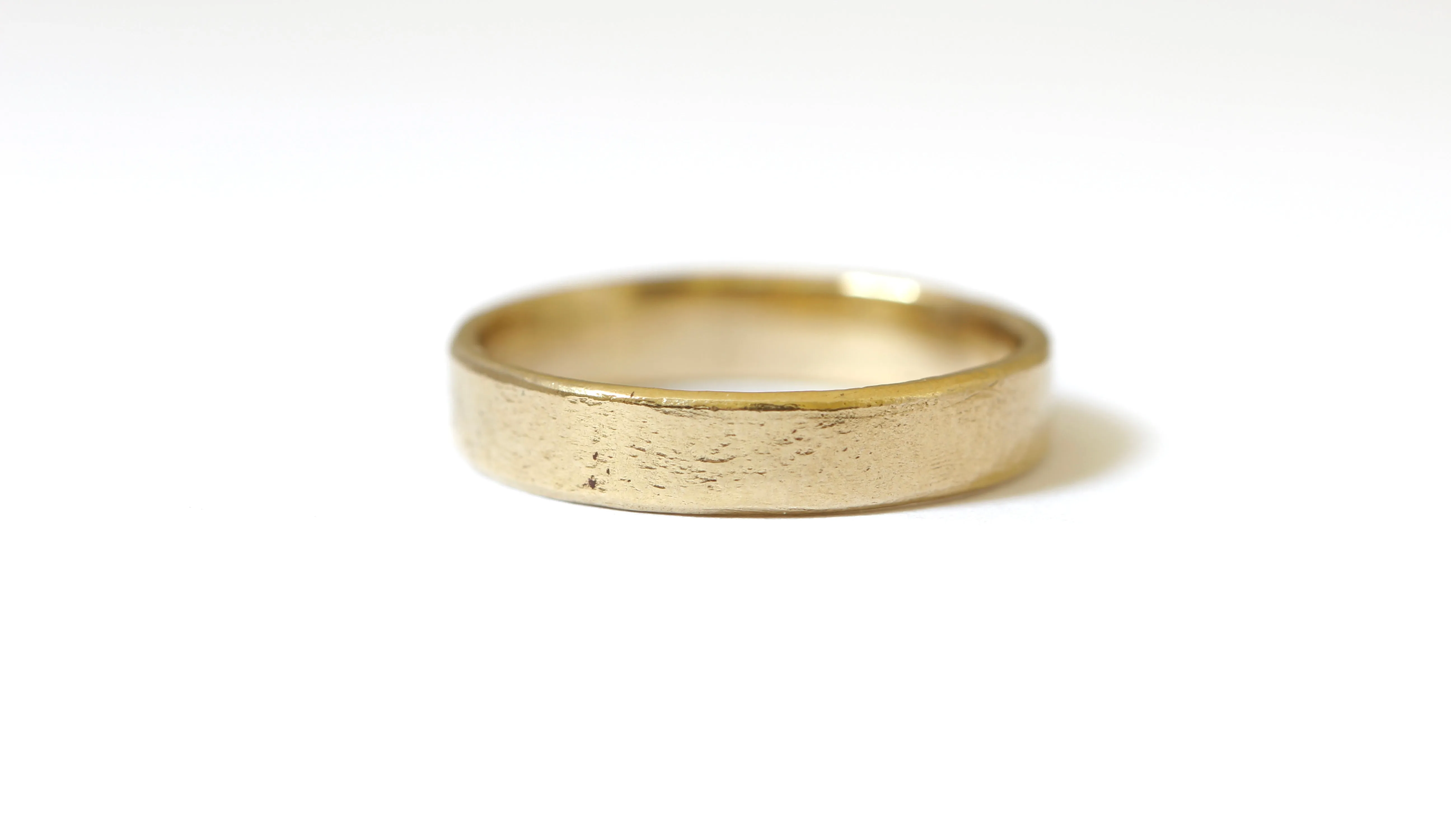 Textured 14k yellow gold wedding ring stacker