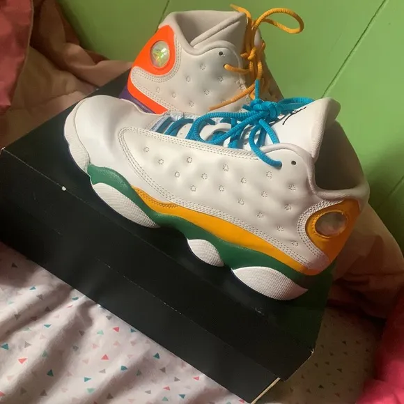 These shoes are the Jordan 13 retro KSA (PS)