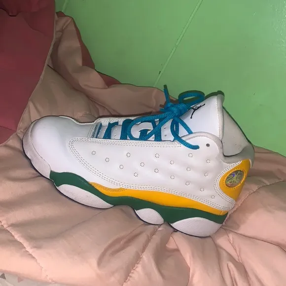 These shoes are the Jordan 13 retro KSA (PS)
